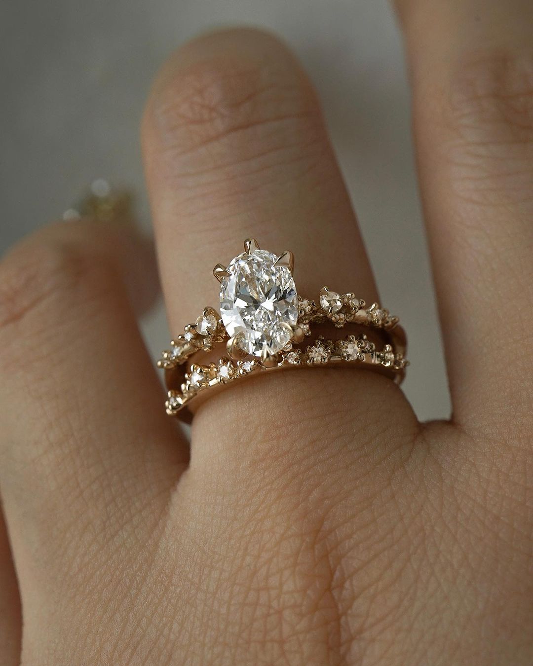 Nereid Ring ft. Oval cut Diamond, paired with White Wisp band - Laurie Fleming Jewellery