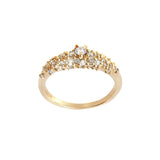 A product photo of Laurie Fleming Jewellery's "Diamond Mix Moss Signet Ring," a bold solid gold signet-style ring encrusted with varying sizes of round brilliant cut diamonds and rose cut diamonds on the band. The ring is on a white background.