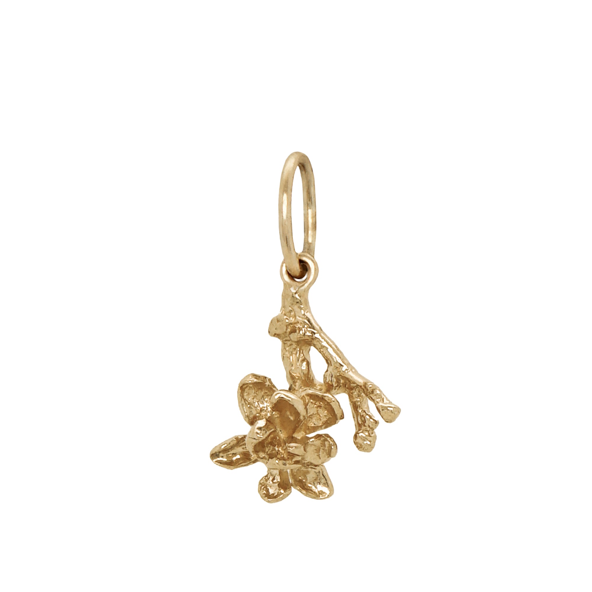 A hanging magnolia branch with one blooming flower charm - Laurie Fleming Jewellery