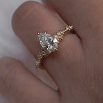 Laurie Fleming Jewellery custom pear cut diamond Daphne ring, worn on a hand