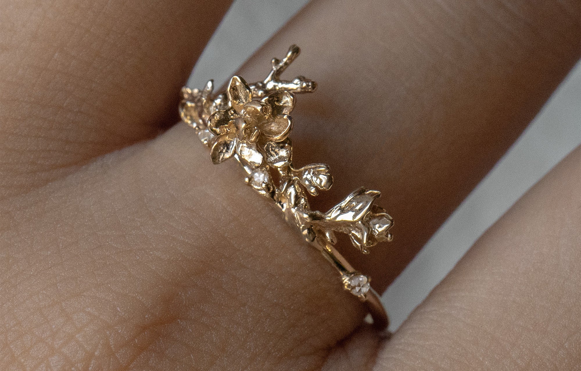 An Asrai Garden Ring with Sleeping Petal Band, Magnolia Branch, Diamond Dewdrops - Laurie Fleming Jewellery
