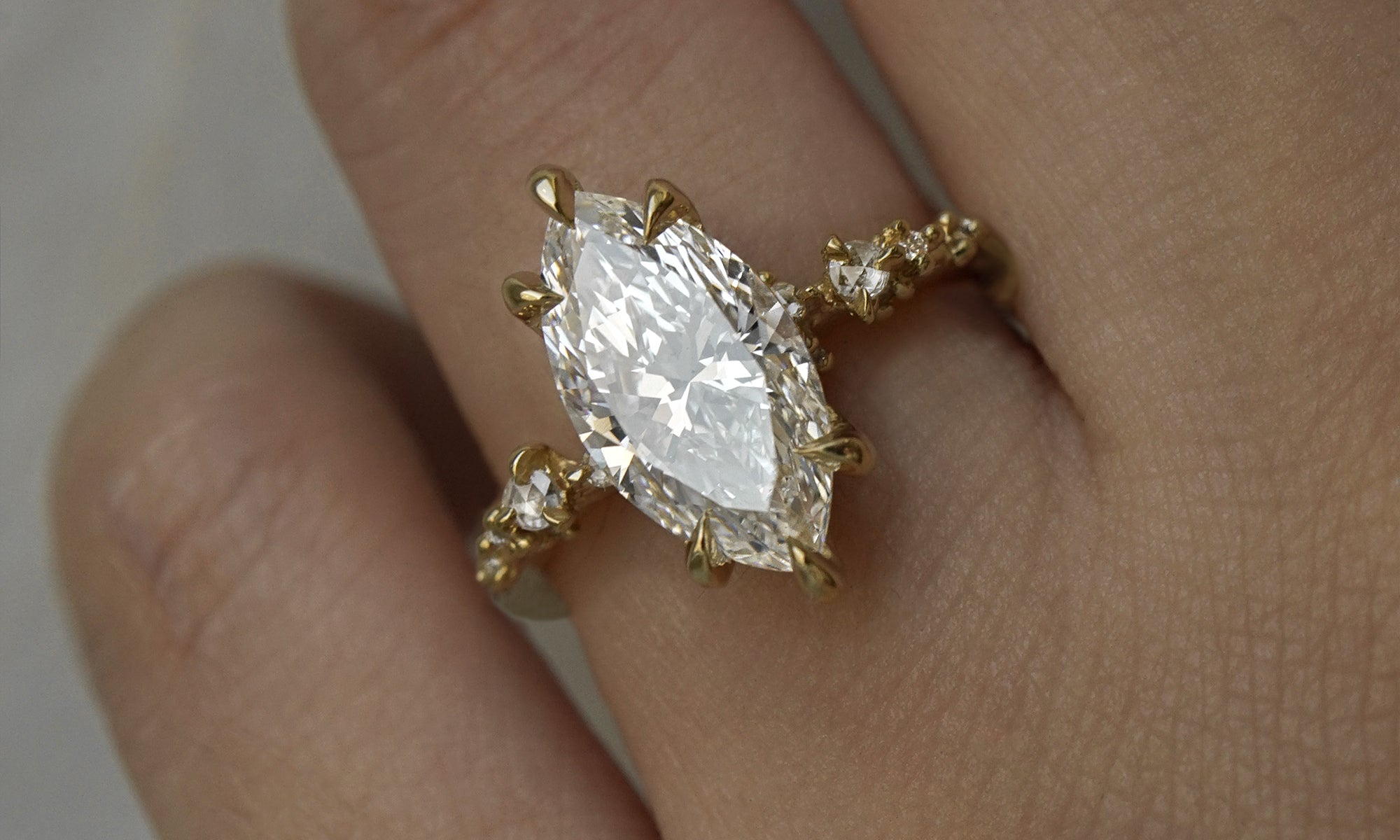 Nereid Ring ft. 2.01ct Marquise Cut Diamond (12.37 x 6.57mm) in 18k yellow gold. Outermost diamonds have been removed to accommodate small ring size (3.25) - Laurie Fleming Jewellery