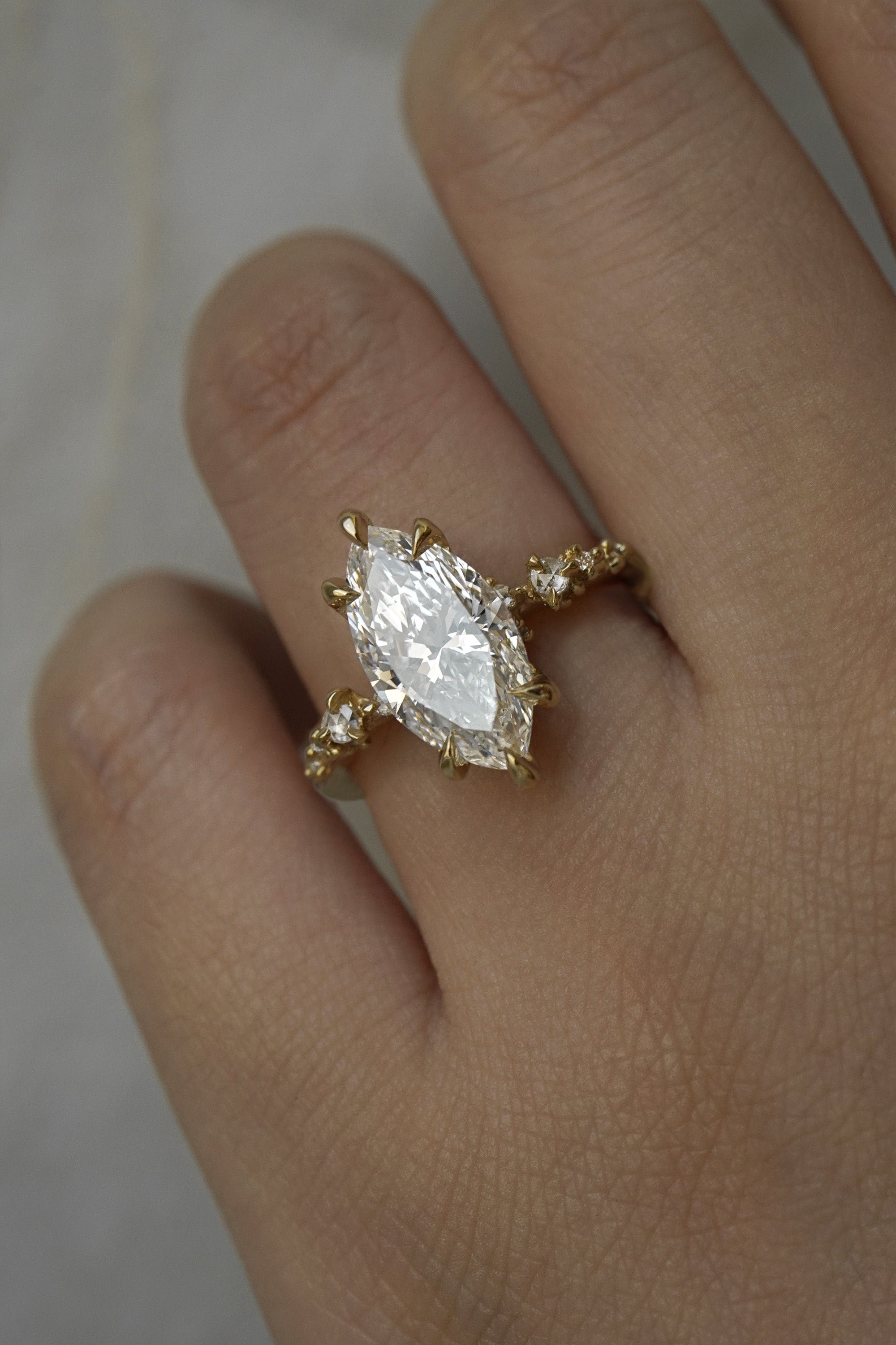 Nereid Ring ft. 2.01ct Marquise Cut Diamond (12.37 x 6.57mm) in 18k yellow gold. Outermost diamonds have been removed to accommodate small ring size (3.25) - Laurie Fleming Jewellery