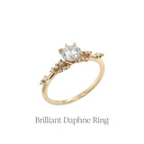 The Daphne Engagement Ring by Laurie Fleming Jewellery, with rose cut and brilliant diamond clusters on the band.