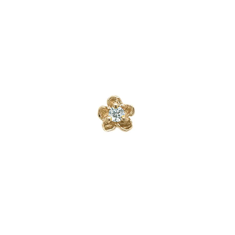 Laurie Fleming Jewellery "Buttercup Stud" earring, featuring a petite hand-carved buttercup flower with a round brilliant cut diamond centre. The earring is on a white background.