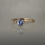 One of a kind Nereid ring featuring an oval artist cut light blue-violet sapphire centre - Laurie Fleming Jewellery