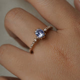 One of a kind Nereid ring featuring an oval artist cut light blue-violet sapphire centre - Laurie Fleming Jewellery