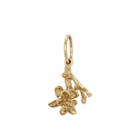 A hanging magnolia branch with one blooming flower charm - Laurie Fleming Jewellery