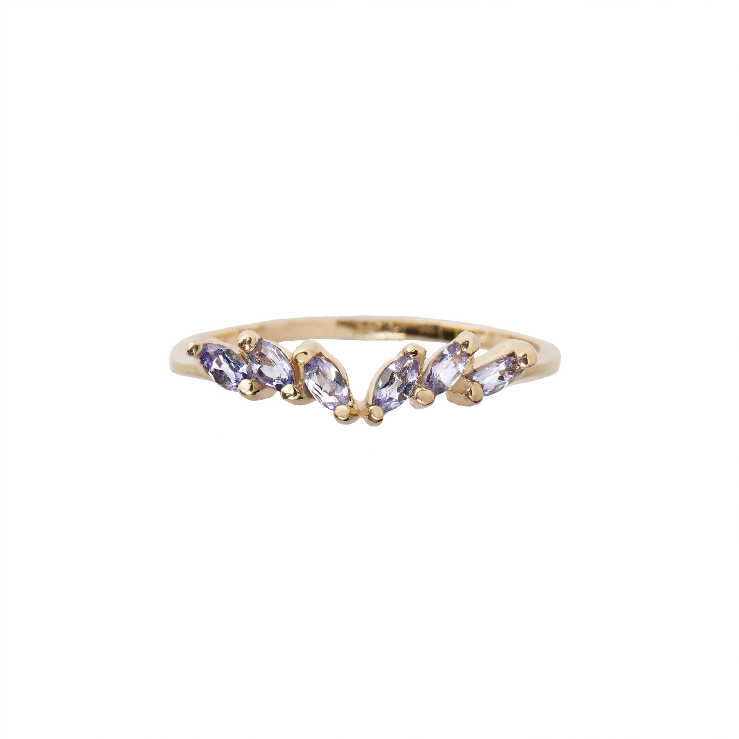 The Tanzanite Jasmine Ring featuring marquise cut tanzanites on the handcarved solid gold band. The ring is against a white background.