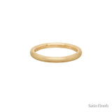 A stock photo of Laurie Fleming Jewellery's plain solid gold "Peach" band, a 2.1mm wide round wire stacking ring/wedding band, handmade in Toronto. The ring has a soft satin brushed finish and is on a white background.