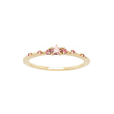 Laurie Fleming Jewellery's "Pink Sapphire Gradient Water Lily Ring," a delicate solid gold stacking ring with pink gradient sapphires scattered along the band. The ring is on a white background.