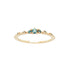 Laurie Fleming Jewellery's "Sapphire Water Lily Ring," a delicate solid gold stacking ring with blue-green teal sapphires scattered along the band. The ring is on a white background.