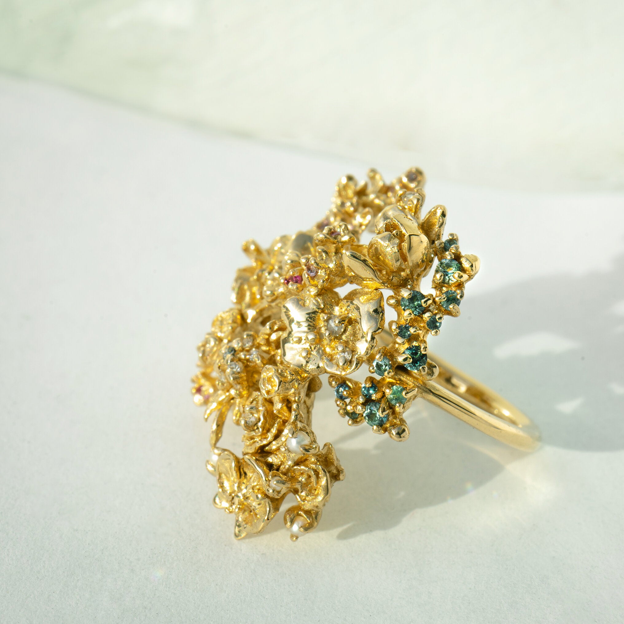 Asrai Garden ring with Anemone, Lotus and lily pad, roses, orchid, moss, peonies, diamond dewdrops, and more out of focus - Laurie Fleming Jewellery